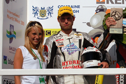 Guy Martin on the podium at the North West